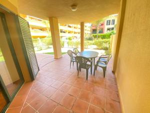 Apartamento bajo con jardín en playa Atlanterra