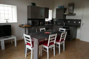 Appartements Les ecuries du chateau : photos des chambres