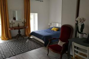 Appartements Les ecuries du chateau : photos des chambres