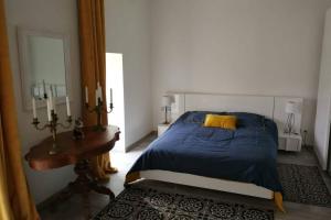 Appartements Les ecuries du chateau : photos des chambres