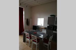 Appartements Les ecuries du chateau : photos des chambres