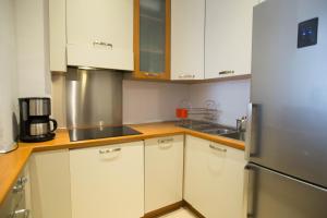 Appartements Le Coin Du Marche : photos des chambres