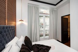 Appartements LE MARAIS PRESTIGE Luxueux - Cosy - Wifi : photos des chambres