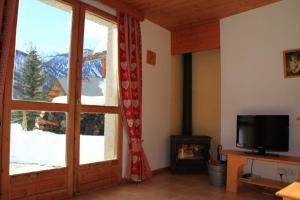 Chalets Le Taquo Hameau des Chazals Nevache Hautes Alpes : photos des chambres