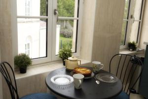 Appartements Appartement Cosy et Lumineux idealement place : photos des chambres