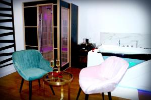 Appartements Le Venus - Appartement SPA Privatif Balneo Sauna : photos des chambres