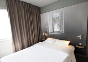 Hotels B&B HOTEL Valence TGV Romans : photos des chambres