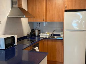 Apartments Sant Lluis CENTER, 2 min walk from the sea