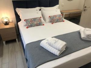 Triple Room with Garden View room in PORTO PORTES suites