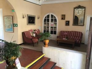 Hotels L'ilot Fleuri : photos des chambres