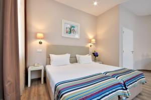 Twin Room with Extra Bed room in Porto Domus Hotel