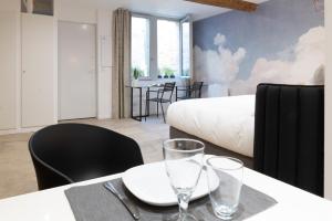 Appartements Design & Cosy - Centre historique Ecusson : photos des chambres