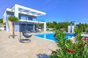 Villa QUADRA with heated pool