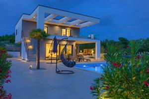 Villa QUADRA with heated pool