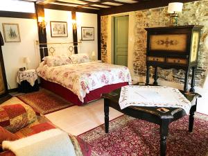Appartements La Ferme Studio Apartments : photos des chambres