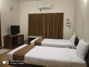 Hanu Reddy Residences Wallace Garden