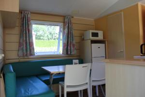 Camping Familial paisible avec piscine, mobil home , chalet, Studio & emplacement nue