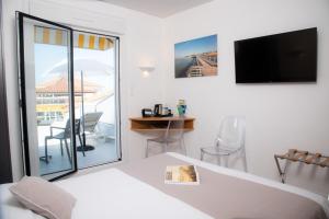 Hotels Hotel Les Dunes : photos des chambres