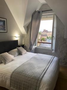 Hotels Logis Hostellerie des Ducs : photos des chambres