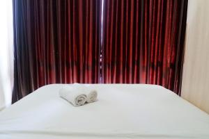 Best View 2BR Apartment at Tamansari Papilio By Travelio