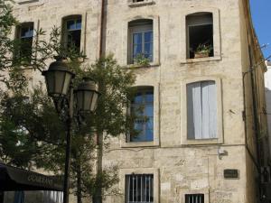 Appartements Design & Cosy - Centre historique Ecusson : photos des chambres