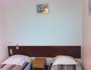 Hotels Hotel Moderne : Chambre Lits Jumeaux