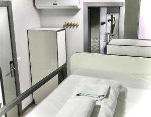 Bed in 4-Bed Mixed Dormitory Room room in Quartier Bilbao Hostel
