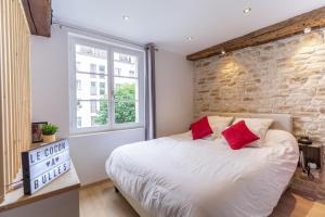 Appartements Cocon a Bulles Chic vue Cathedrale avec Spa-jacuzzi : photos des chambres