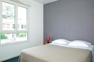 Appart'hotels Sejours & Affaires Annecy Le Pont Neuf : photos des chambres