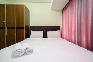 Elegant Nifarro Park 2BR Apartment with Best View By Travelio