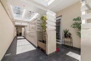 GuestHost - Scala Santa & Laterano Open Space