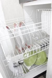 Simply Homey 2BR Apartment Parahyangan Residence By Travelio