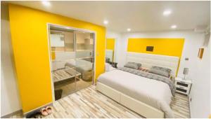 Maisons d'hotes Chambre privee Cosy a proximite de Roissy, Parc Asterix : photos des chambres