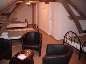 B&B / Chambres d'hotes Grange d'Anjeux Bed & Breakfast : photos des chambres