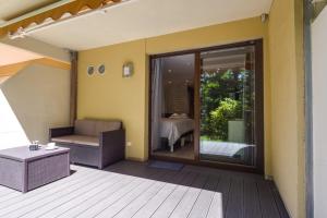 Appartements Wellholidays 19 - studio balneo et terrasse piscine : photos des chambres