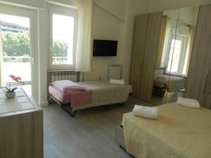 Appartamenti Via Cortonese 1