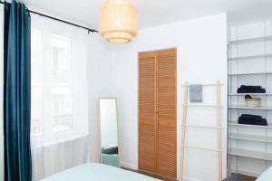 Appartements Coeur de ville Enghien les Bains - 2 pieces Lumineux et Chaleureux - 15 min de Paris : photos des chambres