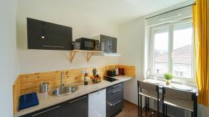 Appartements Cosy Apparts Brive : photos des chambres