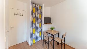 Appartements Cosy Apparts Brive : photos des chambres