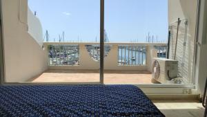 Appartements Classe 3 etoiles - Magnifique vue sur le port : photos des chambres