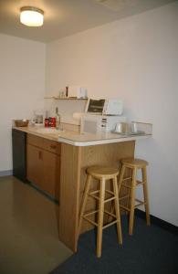 Queen Room with Kitchenette room in Ponderosa Motel
