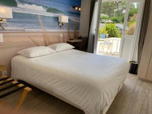 Hotels Les Vagues Hotel Restaurant : photos des chambres
