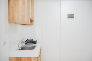 Simply and Homey 1BR Apartment at M Town Residence By Travelio