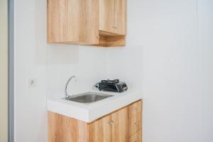 Simply and Homey 1BR Apartment at M Town Residence By Travelio