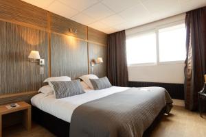 Hotels The Originals Boutique, Hotel Neptune, Montpellier Sud (Inter-Hotel) : photos des chambres