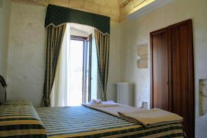 Rooms Dimora Arco - Affitti Brevi Italia
