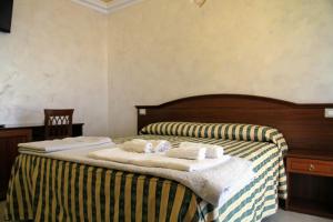 Rooms Dimora Arco - Affitti Brevi Italia