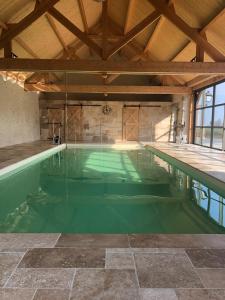 Maisons de vacances MAISON DE VACANCES AVEC PISCINE INTERIEURE - Le Grand Champagne : photos des chambres