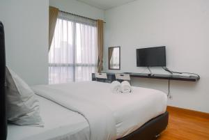 Minimalist and Strategic 1BR at Tamansari Semanggi Apartment By Travelio