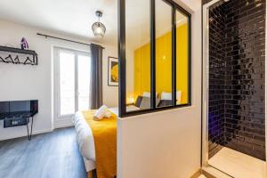 Appartements Le Black & Yellow - Appart'Hotel SPA - Clim - Melina & Alfred Agen : photos des chambres